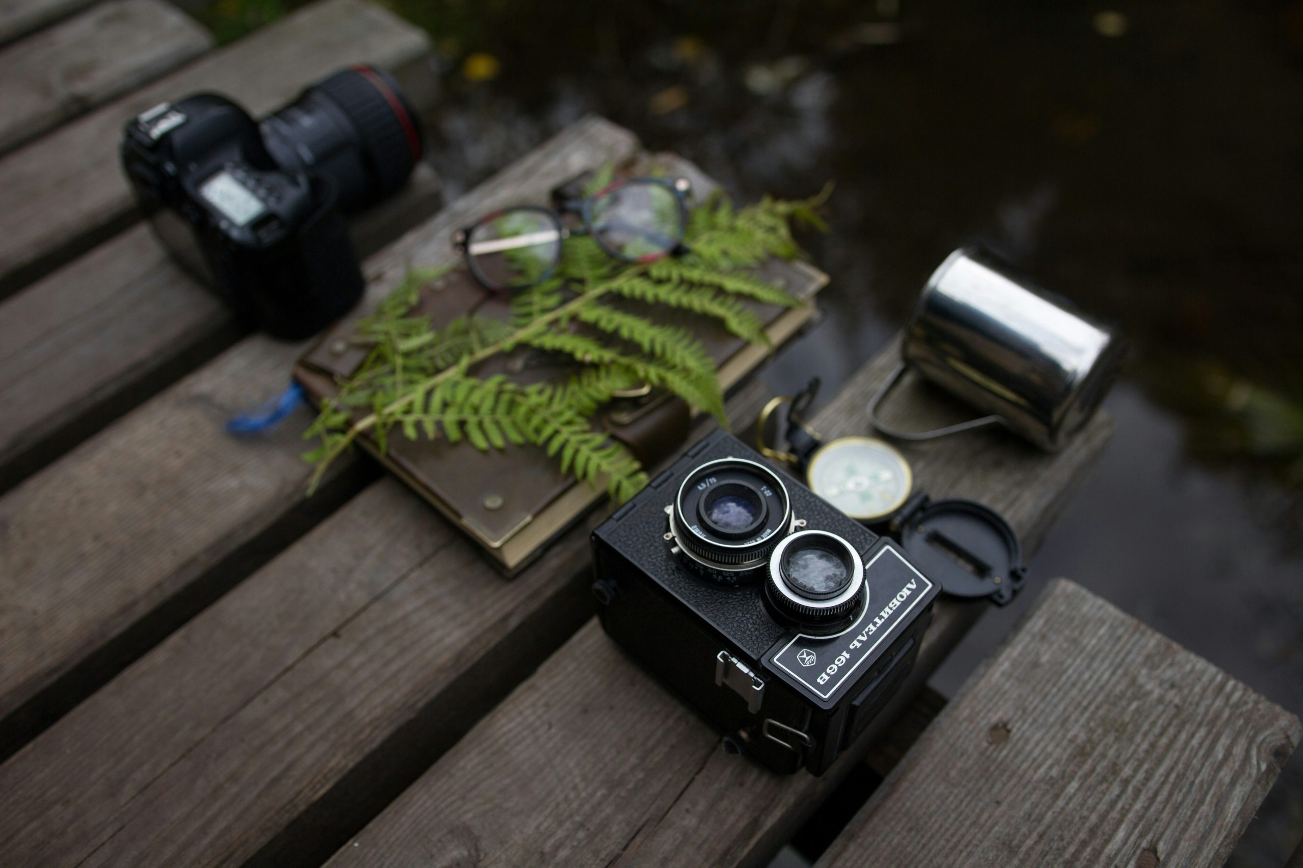 A female hiker capturing action shots with her waterproof camera